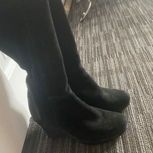 Black knee-high boots